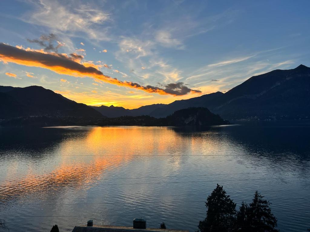 Golden sunset reflected across Lake Como