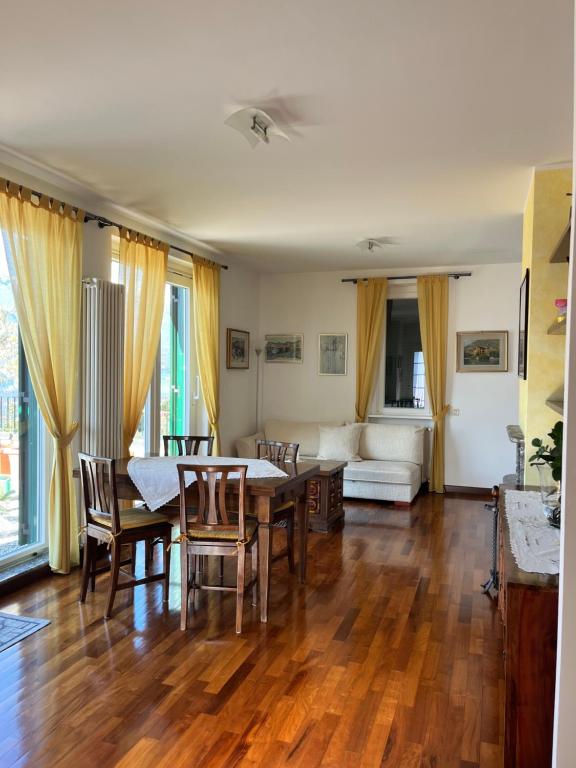 Spacious living and dining room with full-height terrace doors